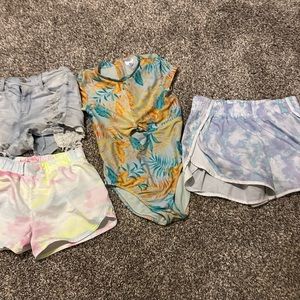 Variety of never used or lightly used girls size 12 clithes